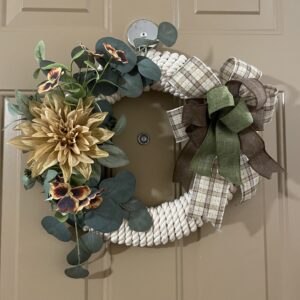 White rope and floral wreath